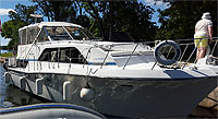 1987 Carver 3297 Mariner sold by a marine, boat and yacht broker in the Pickering, Whitby, Bowmanville, Peterborough, Belleville, Trenton and Brighton areas of  Ontario, Canada.