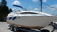 2003 BAYLINER 245 with trailer sold by a marine, boat and yacht broker in the Pickering, Whitby, Bowmanville, Peterborough, Belleville, Trenton and Brighton areas of  Ontario, Canada. 
